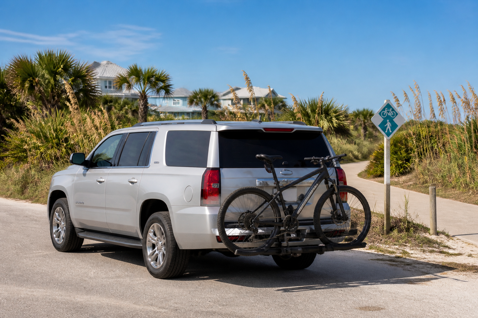 Visitors cycling a scenic coastal path near Rosemary Beach, Florida, a popular way to explore the 30A Gulf Coast