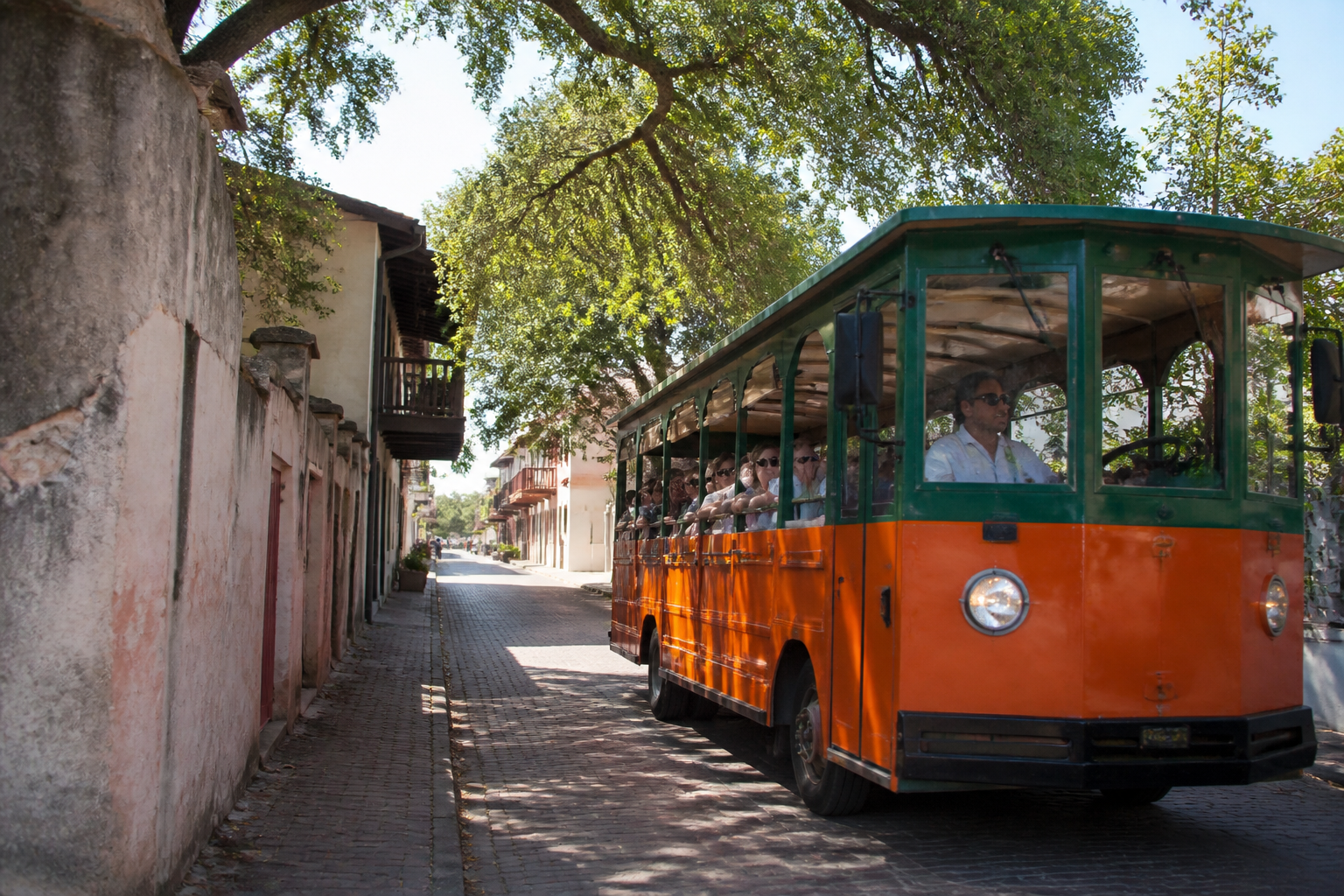 Visitors boarding a historic trolley to get around St. Augustine, Florida's cobblestone streets